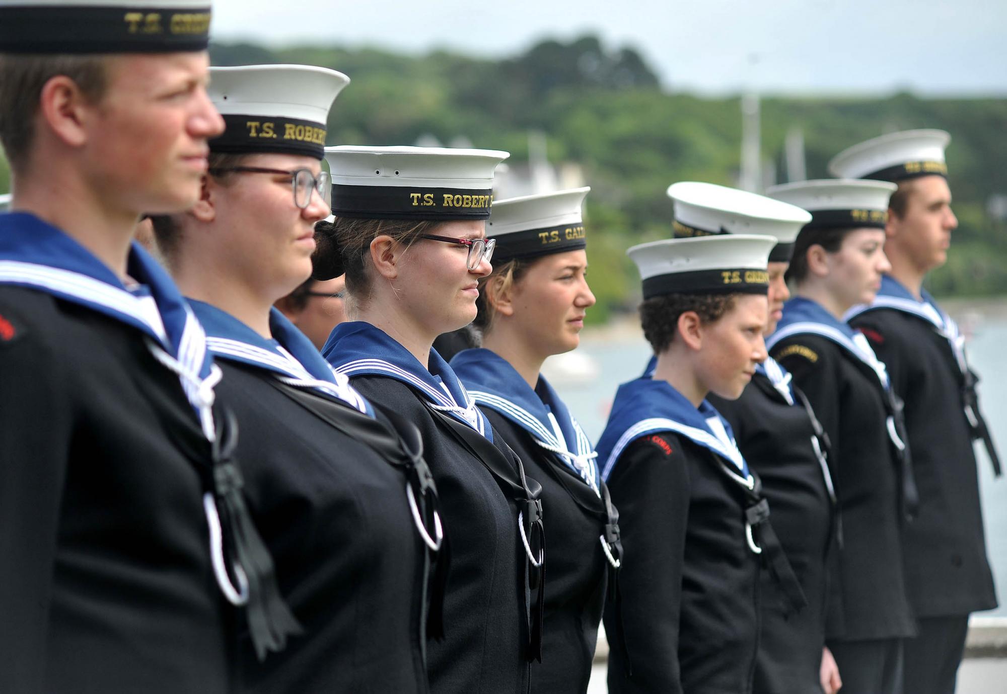 Sea Cadets lined up in uniform by the water